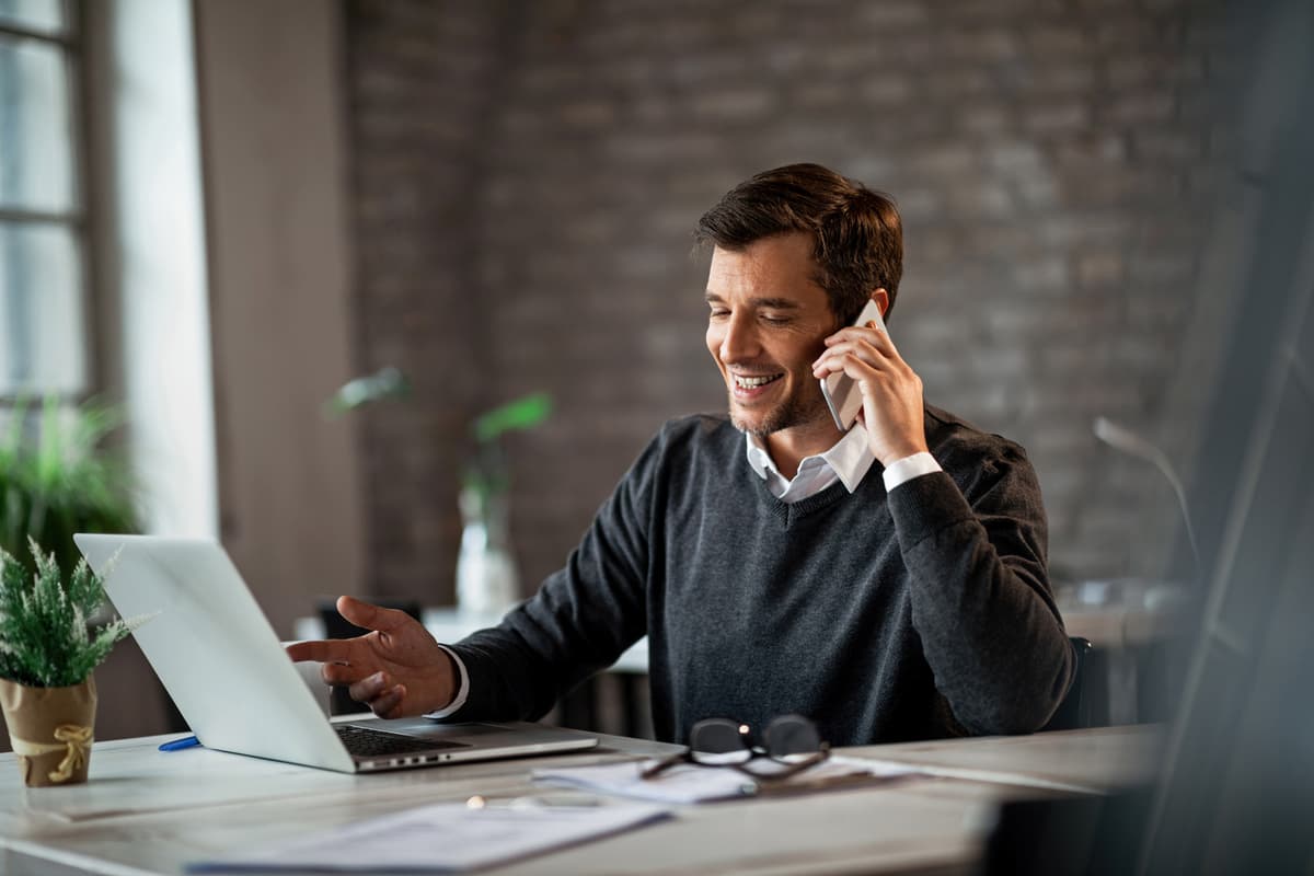 Happy user using ServX Finance platform